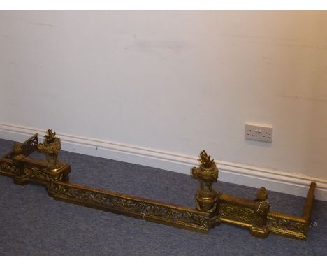 A large 19th century gilt-metal French Louis XVI-style chenet (in separate parts), the two neo-classical-style urns with flam