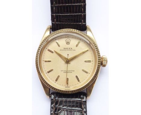 A gentleman's 9-carat yellow-gold cased Rolex Oyster Perpetual wristwatch; the dial signed Rolex Oyster Perpetual Officially 