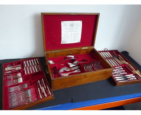 A 19th century oak-cased three-tier silver-plated flatware/cutlery service by Elkington & Co (original label label to undersi