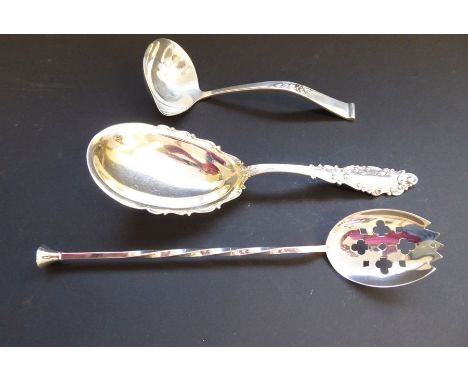 An ornate early 20th century oval serving spoon marked 'sterling' together with one other ladle marked 'Reed &amp; Barton, st