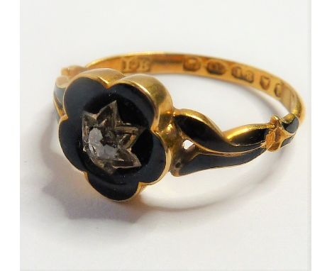 An early Victorian enamel, diamond-set and 18-carat yellow-gold mourning ring; the central black-enamel flower applied to a d