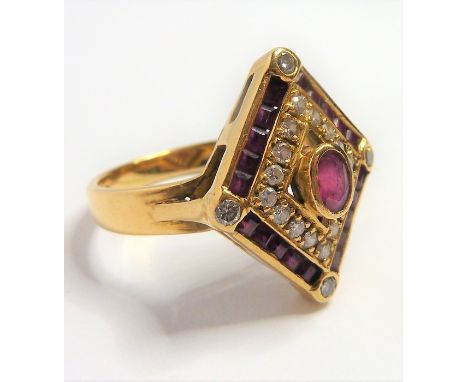 A ruby and diamond-set 18-carat yellow-gold dress ring; the lozenge-shaped plaque centrally set with an oval ruby collet with