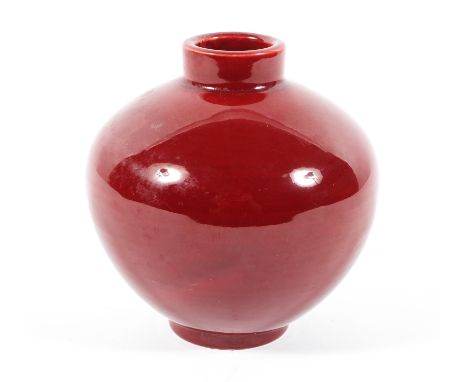 A Chinese porcelain monochrome ox blood red vase, oviform moulded with light ribbing, 20th century, 12.5 cm high