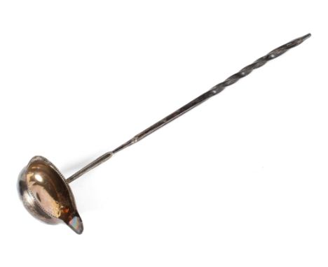 A Georgian toddy ladle, hallmarked for London, 1778, with spirally handle probabky baleen, with beaded rims, the bowl engrave