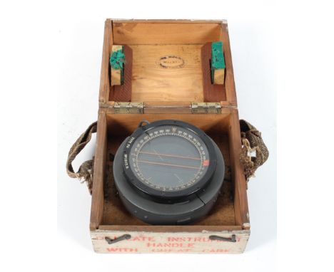 A type P8 miltary compass, marked No. 10115.H. fixed on grey metal base bearing gilt metal label A.M. Ref. No. 6A/0.726, in w
