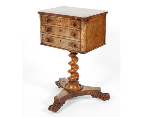 A Victorian walnut small chest of drawers, with three short drawers, one being a deeper dummy-fronted drawer, on barley twist