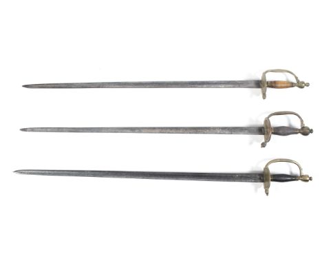 Three infantry officer's swords with brass hilts, the first by JJ Runkel, Solingen, late 18th century bearing the crowned GR 