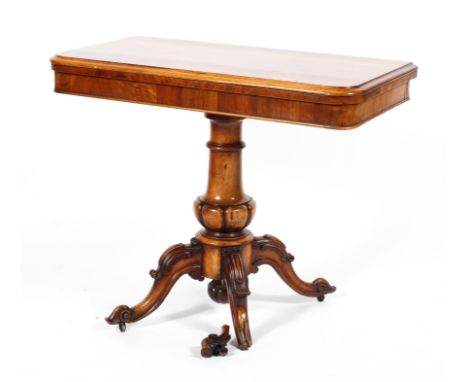 A Victorian rosewood folding card table, with moulded sliding top above concealed two part drawer, on a baluster gadrooned pe