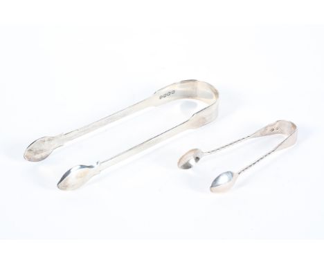 A Georgian silver sugar nip, together with another Victorian pair and a small condiment spoon, the first hallmarked for Londo