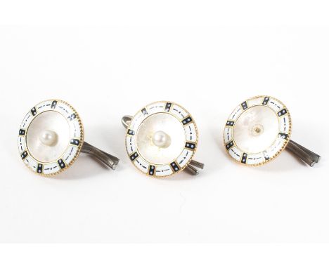 A set of three button clips each finished with mother of pearl and enamel. Each individually stamped '18; Rd 494720' 7.2 gram