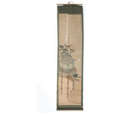 A Chinese silk mounted painted paper scroll, decorated with a jardiniere of flowers on bamboo stand, inscribed with thirteen 