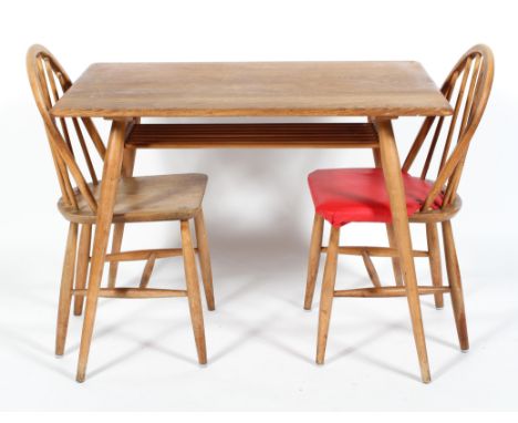 An Ercol blonde elm and beech rectangular dining table with lower shelf and two dining chairs, the table 73 cm high x 99 cm w