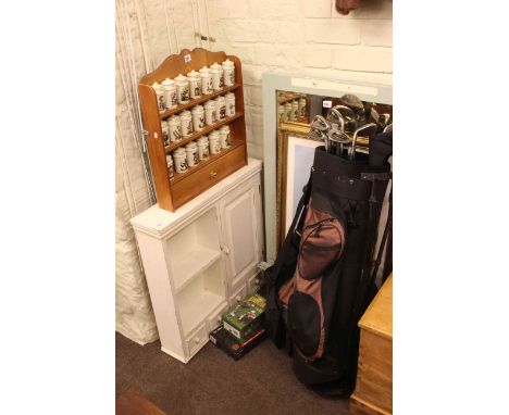 Golf bag and clubs, three pictures, two mirrors, spice rack and jars and wall cupboard.
