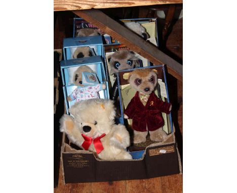 Box of Meerkat 'Compare the Market' toys and Steiff teddy bear.