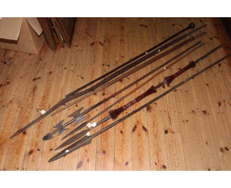 Five tribal spears, long handled knob kerri and wooden bow.