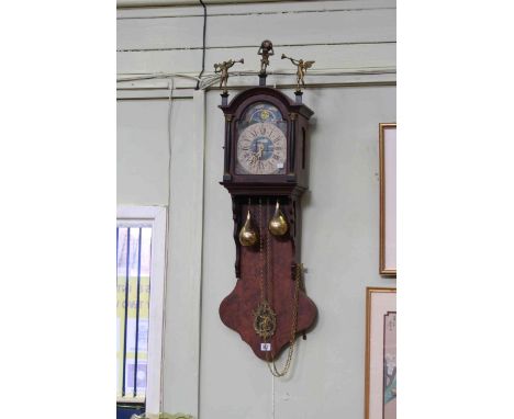 Dutch double weight wall clock having arched moon phase dial.