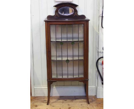 Edwardian mahogany, line inlaid and painted mirror back bow front vitrine with leaded glass door, 61cm by 143.5cm.