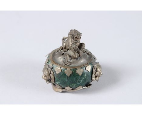 A SMALL ANTIQUE CHINESE GREEN JADE AND SILVER CIRCULAR CENSER, the lid with a foo dog. 2.2ins high.