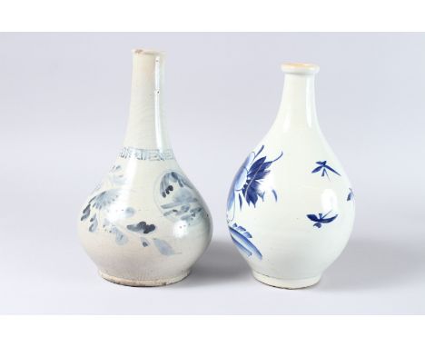 TWO KOREAN BLUE AND WHITE BOTTLE VASES. 10.5ins high.