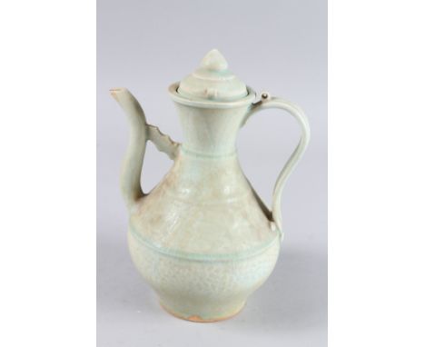 A KOREAN PLAIN CELADON TEAPOT AND COVER. 10ins high.