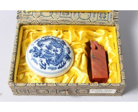 A SMALL CHINESE BLUE AND WHITE CIRCULAR POT, 2ins diameter, and a wax seal in a box.
