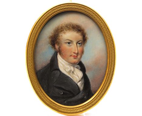 ë Attributed to William Sherlock (c.1738-c.1806) Portrait miniature of a gentleman with curly hair, head and shoulders, weari