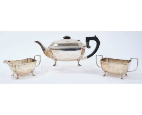 1930s Art Deco style silver three piece teaset, comprising teapot of rectangular faceted form, with angular ebony handle and 