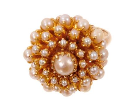 Cultured pearl cluster cocktail ring with a domed flower head cluster of cultured pearls in claw setting on yellow gold shank