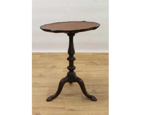 Edwardian carved mahogany tripod wine table, the dished shaped top on spiral carved knopped column and tripod cabriole base, 