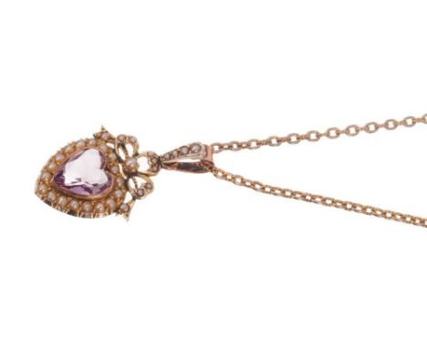 Edwardian 9ct gold amethyst and seed pearl heart shaped pendant on chain with a heart shaped amethyst surrounded by a seed pe