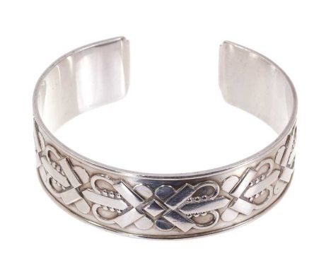 Georg Jensen silver cuff bangle designed by Harald Nielsen, with stylised Celtic design, model number 78, signed 'Georg Jense