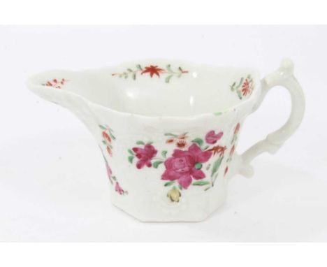Worcester cream boat, circa 1760, with hexagonal base, polychrome painted with flowers in the famille rose style, 5.75cm high