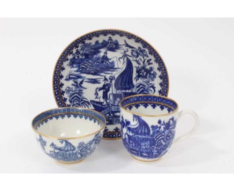 Worcester Fisherman and Cormorant pattern trio, circa 1775, with gilt borders, crescent marks to bases, the saucer measuring 