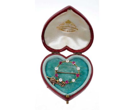 Edwardian diamond and ruby circular brooch, with five round mixed cut rubies, possibly of Burma origin, interspaced by five o