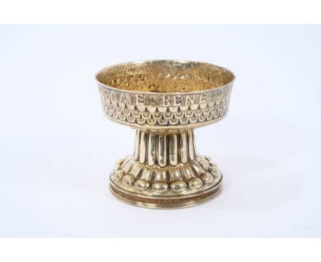 Edwardian silver gilt replica of "The Tudor Cup", in the form of a standing cup with font-shaped bowl, chased with scale pane
