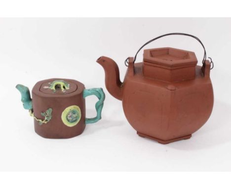 Two Chinese Yixing teapots, 19th/20th century, the first of hexagonal form, seal marks to cover and base, 16cm high, the othe