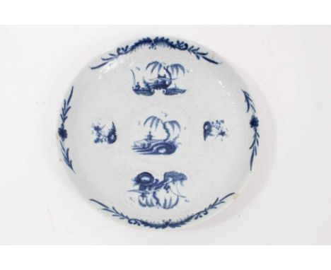 Worcester blue and white strap-fluted saucer dish, circa 1756, decorated with scrollwork panels containing Chinese landscapes