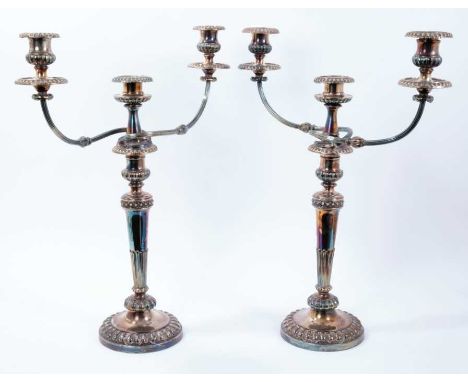 Pair of late 18th/early 19th century Old Sheffield Plate three light candelabra, with tapering stems and fluted and bead deco