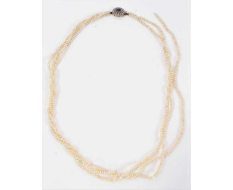 Three row seed pearl necklace with a sapphire and diamond clasp in original box (one string broken)