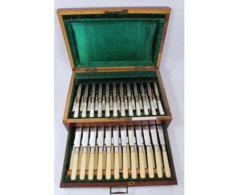 Set of 12 pairs of Victorian silver plated dessert knives and forks, with engraved blades and mother of pearl handles, togeth