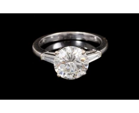 Fine diamond single stone ring with a brilliant cut diamond estimated to weigh approximately 2.95-3cts, in four claw setting 