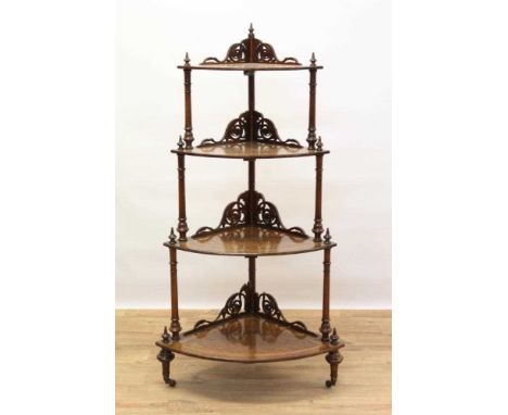 Victorian inlaid burr walnut veneered bow front four tier corner whatnot with finely pierced scroll brackets and turned suppo