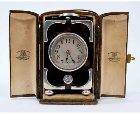 Fine quality early 20th century carriage clock, with eight day repeat movement striking on a gong and silvered dial with Arab