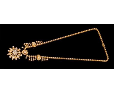 Victorian gold seed pearl and diamond pendant necklace with detachable pendant/brooch, the star shape flower with a central o