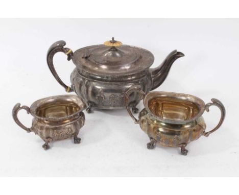 Edwardian silver three piece tea set, comprising teapot of compressed baluster form, with overlaid floral decoration, silver 