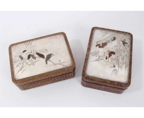 Pair of late 19th century Japanese mixed metal and straw work boxes, each of rectangular cushion form with relief ornament of