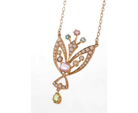 Edwardian gold peridot, pink stone, blue stone and seed pearl pendant necklace on chain with Art Nouveau scroll design suspen