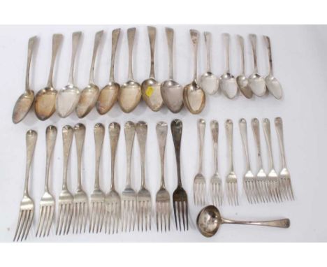 Composite set of early 19th century Old English pattern flatware, with engraved armorial crest, comprising 9 table spoons, 9 