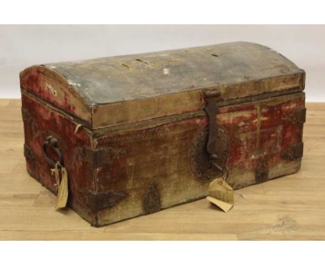 Good 17th century velvet upholstered dome top trunk with iron bound strap work mounts and ornate lock plate, flanking carryin