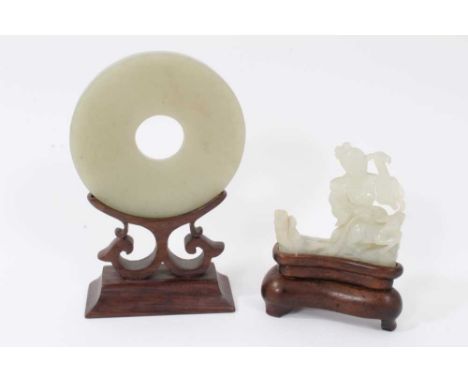 Good Chinese carved jade figure, depicting a deity figure with a deer, 6cm long, raised on hardwood stand, together with a ca